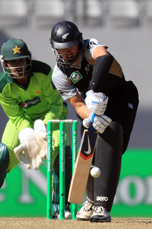 Peter McGlashan batting with Umar Akmal behind the stumps