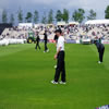 New Zealand players warming up with Chris Harris in the foreground