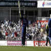 Marcus Tresocthick celebrating after reaching his milestone