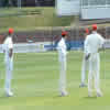 Brendon McCullum with three of his team mates