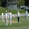 Paul Wiseman and Chris Cairns discuss tactics with Stephen Fleming and Matthew Bell at the crease