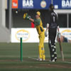 Coleman collects the ball while Tiffen looks on