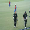Daniel Vettori and Daryl Tuffey with Graeme Hick in the background