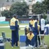 Sanath Jayasuriya (kneeling) & Farveez Maharoof (with cup)