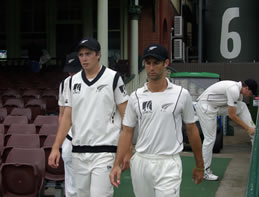 Tim Southee and Grant Elliott with Kyle Mills in the background