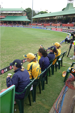 The Australian team watching the play unfold from the boundary rope